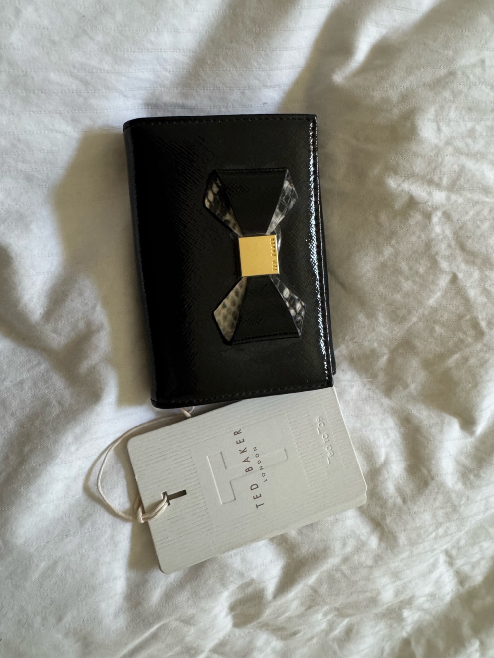 Ted Baker Black Patent Bow Card Wallet with Gold Accent